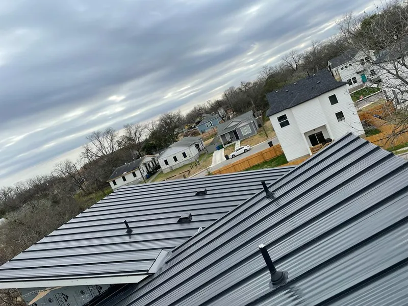 Standing seam metal roof panels with vents for Skylight Repair in Algona